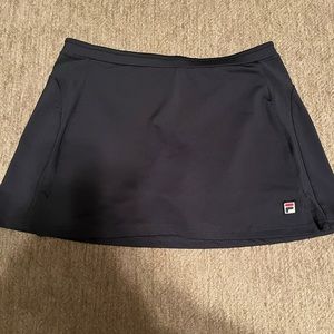 This is a navy skirt that has never been worn